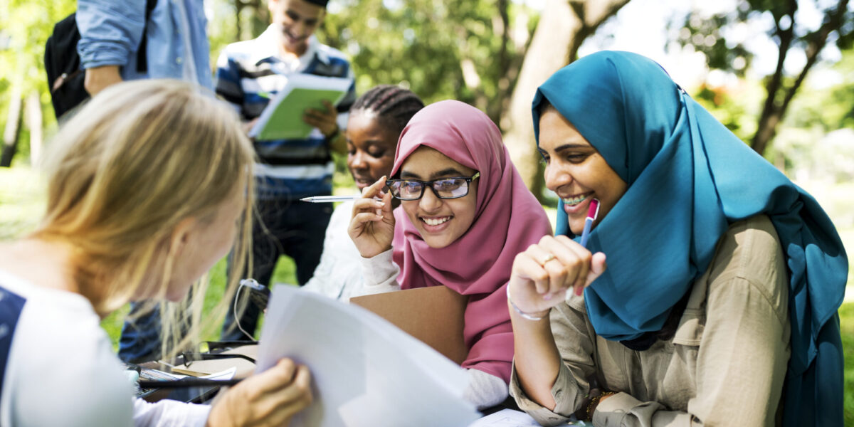 Diverse children studying outdoor